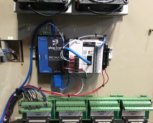A 2-Port Wired Ethernet Connect with 1 port in use is wired to a Scytec Status Relay Controller to collect data from the machine they're connected to.